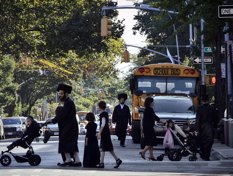 Orthodox Jews in Borough Park, a neighborhood in the Brooklyn borough of New York. (AP Photo/Bebeto Matthews, File)